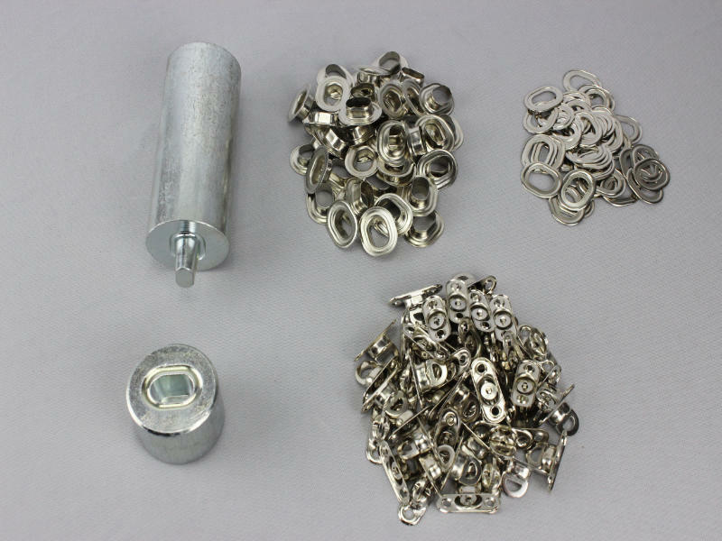Oval Einschlagstempel 22,5x13,5 mm + 50 Ösen Nickel + 50 Drehverschluß