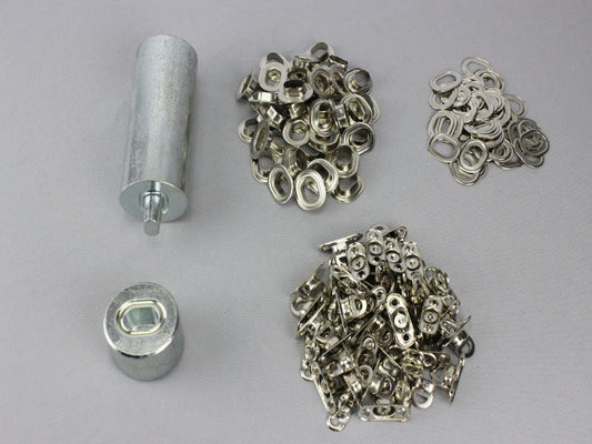 Oval Einschlagstempel 22,5x13,5 mm  + 50 Ösen Nickel + 50 Drehverschluß